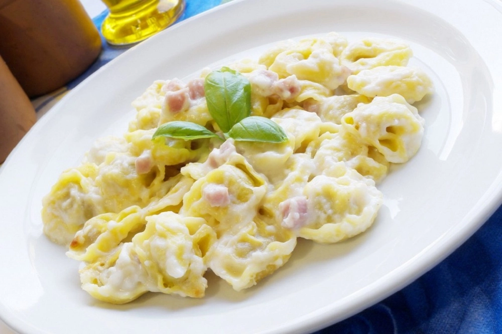 Tortelli* Panna (f) e Prosciutto (s)